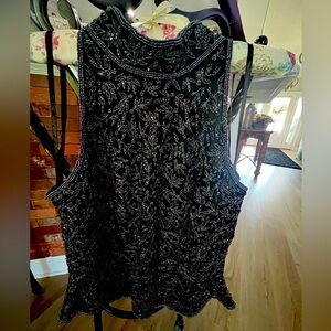 Evening wear top,high-shoulders and collar,black lined silk covered w blue beads